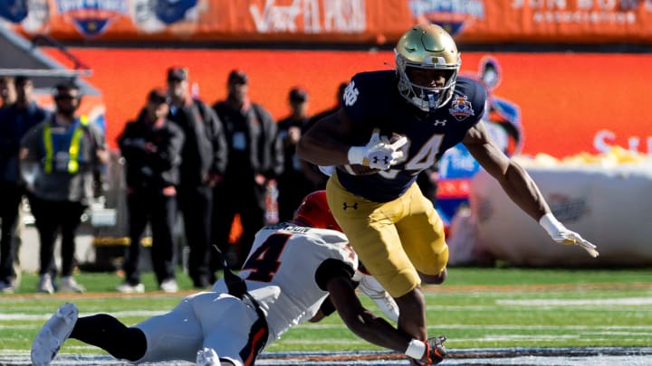 Notre Dame running back Jadarian Price (24) runs for yardage against Oregon State in the 90th Sun Bowl game in El Paso, Texas Friday, Dec. 29, 2023,