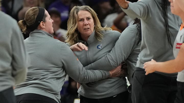 Sep 26, 2025; Phoenix, Arizona, USA; Minnesota Lynx head coach Cheryl Reeve is held back after being ejected during game three against the Phoenix Mercury of the second round for the 2025 WNBA Playoffs at PHX Arena. Mandatory Credit: Rick Scuteri-Imagn Images Sep 26, 2025; Phoenix, Arizona, USA; Minnesota Lynx head coach Cheryl Reeve is held back after being ejected during game three against the Phoenix Mercury of the second round for the 2025 WNBA Playoffs at PHX Arena. Mandatory Credit: Rick Scuteri-Imagn Images