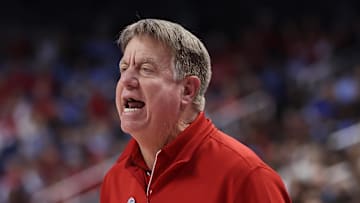 Mar 8, 2025; Greensboro, NC, USA; NC State Wolfpack head coach Wes Moore reacts to a play during the third quarter against North Carolina Tar Heels at First Horizon Coliseum. Mandatory Credit: Cory Knowlton-Imagn Images