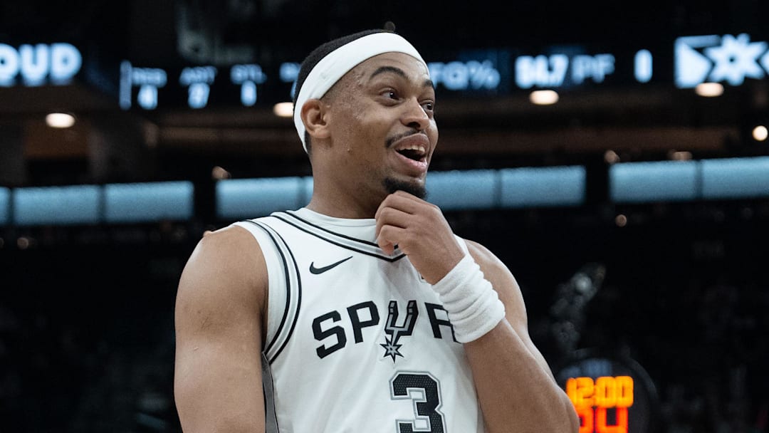 Mar 30, 2026; San Antonio, Texas, USA;  San Antonio Spurs forward Keldon Johnson (3) talks to a fan in the second half against the Chicago Bulls at Frost Bank Center. Mandatory Credit: Daniel Dunn-Imagn Images