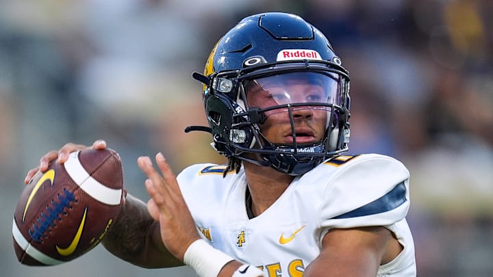 North Carolina A&T escapes in-state rival Winston Salem State University 27-20, in Overtime, 