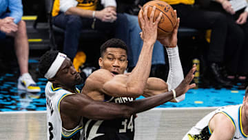 Apr 29, 2025; Indianapolis, Indiana, USA; Milwaukee Bucks forward Giannis Antetokounmpo (34) shoots the ball while Indiana Pacers forward Pascal Siakam (43)  defends during game five of the first round for the 2024 NBA Playoffs at Gainbridge Fieldhouse. Mandatory Credit: Trevor Ruszkowski-Imagn Images