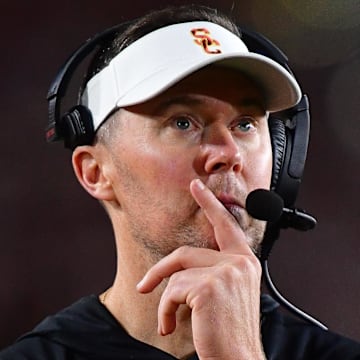 Nov 7, 2025; Los Angeles, California, USA; Southern California Trojans head coach Lincoln Riley watches game action against the Northwestern Wildcats during the second half at the Los Angeles Memorial Coliseum. Mandatory Credit: Gary A. Vasquez-Imagn Images
