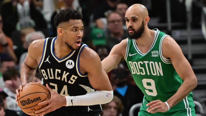 Milwaukee Bucks forward Giannis Antetokounmpo (34) looks for a shot against Boston Celtics guard Derrick White (9) in the third quarter at Fiserv Forum. 