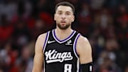 Oct 29, 2025; Chicago, Illinois, USA; Sacramento Kings guard Zach LaVine (8) walks on the court during the first half at United Center.