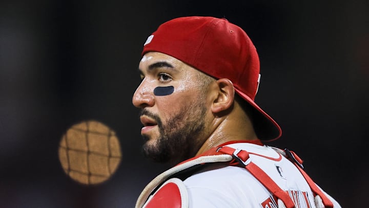 Cincinnati Reds catcher Jose Trevino (35) stands on the field