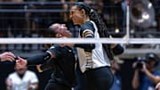 Purdue sophomore Ryan McAleer (3) and senior Akasha Anderson (13) celebrate 