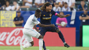 Oct 15, 2017; Carson, CA, USA; Minnesota United FC forward Abu Danladi (9) and LA Galaxy midfielder Jermaine Jones (13) battle for the ball during the second half at StubHub Center. Mandatory Credit: Kelvin Kuo-Imagn Images