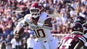 Arkansas Razorbacks quarterback Taylen Green (10) runs the ball against the Mississippi State Bulldogs during the first quarter at Davis Wade Stadium at Scott Field.