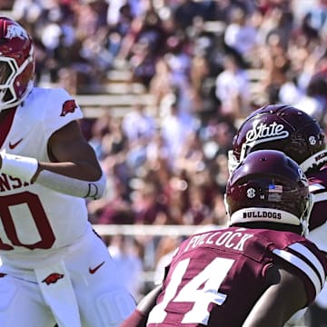 Arkansas Razorbacks quarterback Taylen Green (10) runs the ball against the Mississippi State Bulldogs during the first quarter at Davis Wade Stadium at Scott Field.