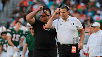 Nov 23, 2024; Miami Gardens, Florida, USA; Miami Hurricanes head coach Mario Cristobal look son from the sideline against the Wake Forest Demon Deacons during the second quarter at Hard Rock Stadium. Mandatory Credit: Sam Navarro-Imagn Images