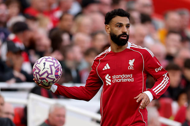 Mohamed Salah holding the ball