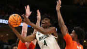 Mar 24, 2024; Memphis, TN, USA; Baylor Bears guard Ja'Kobe Walter (4) shoots against Clemson Tigers