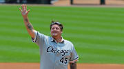 Former Chicago White Sox pitcher Bobby Jenks throws out the ceremonial first pitch prior to the first inning against the Baltimore Orioles at U.S Cellular Field on July 4, 2015.