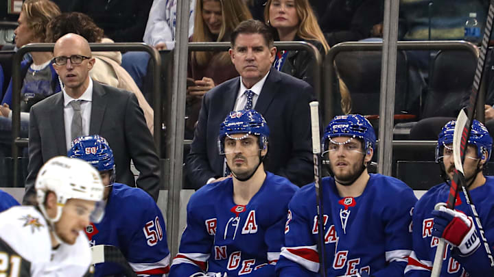 New York Rangers head coach Peter Laviolette watches his team from the bench against the Vegas Golden Knights. New York Rangers head coach Peter Laviolette watches his team from the bench against the Vegas Golden Knights.