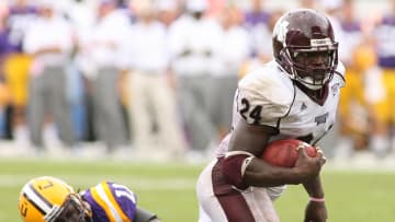 September 26, 2009; Starkville, MS, USA; Mississippi State running back Anthony Dixon (24) carries against LSU linebacker Kelvin Sheppard (11) during 2nd half at Davis Wade Stadium. LSU defeated Mississippi State 30-26. Mandatory Credit: John David Mercer-USA TODAY Sports