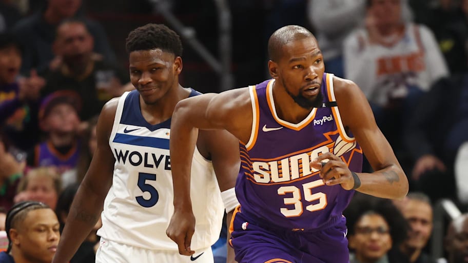 Phoenix Suns forward Durant against Minnesota Timberwolves guard Edwards at Footprint Center.  | Mark J. Rebilas-Imagn Images
