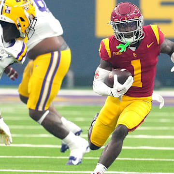 Sep 1, 2024; Paradise, Nevada, USA; Southern California Trojans wide receiver Zachariah Branch (1) runs against the LSU Tigers during the second quarter at Allegiant Stadium. Mandatory Credit: Stephen R. Sylvanie-Imagn Images