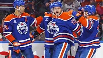 The Edmonton Oilers celebrate a goal scored by forward Adam Henrique (19)