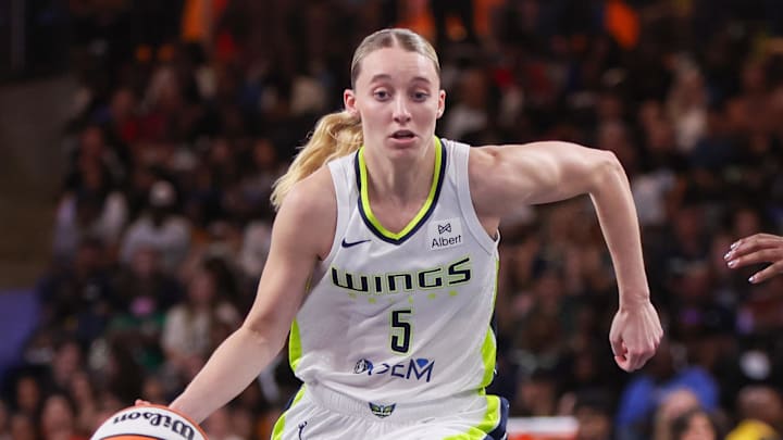 Aug 29, 2025; College Park, Georgia, USA; Dallas Wings guard Paige Bueckers (5) drives to the basket against the Atlanta Dream in the fourth quarter at Gateway Center Arena at College Park. Mandatory Credit: Brett Davis-Imagn Images