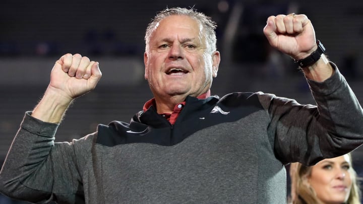 Arkansas Razorbacks coach Sam Pittman calls the Hogs after defeating the Kansas Jayhawks in the 2022 Liberty Bowl at Liberty Bowl Memorial Stadium. Arkansas won 55-53. 