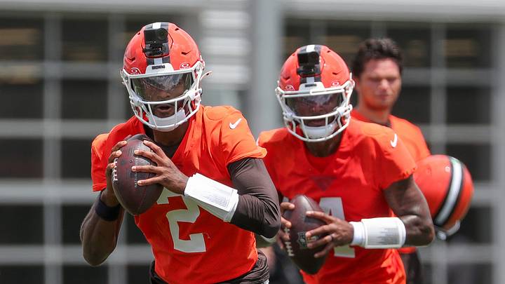 Cleveland Browns quarterbacks Shedeur Sanders, left, and Deshaun Watson