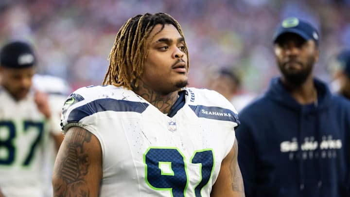 Dec 8, 2024; Glendale, Arizona, USA; Seattle Seahawks defensive tackle Byron Murphy II (91) against the Arizona Cardinals at State Farm Stadium. | Dec 8, 2024; Glendale, Arizona, USA; Seattle Seahawks defensive tackle Byron Murphy II (91) against the Arizona Cardinals at State Farm Stadium. |
