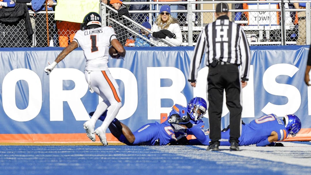 Nov 29, 2024; Boise, Idaho, USA; Oregon State Beavers wide receiver Darrius Clemons (1)  scores a touchdown against the Boise State Broncos at Albertsons Stadium.  Mandatory Credit: Brian Losness-Imagn Images

