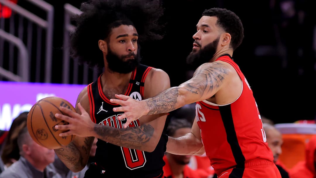 Chicago Bulls guard Coby White (0) looks to pass the ball against Houston Rockets forward Dillon Brooks (9) during the third quarter at Toyota Center. Mandatory Credit: Erik Williams-Imagn Images