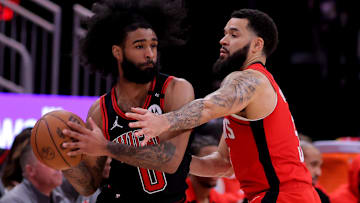 Chicago Bulls guard Coby White (0) looks to pass the ball against Houston Rockets forward Dillon Brooks (9) during the third quarter at Toyota Center. Mandatory Credit: Erik Williams-Imagn Images