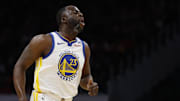 Feb 27, 2024; Washington, District of Columbia, USA; Golden State Warriors forward Draymond Green (23) reacts after making a three point field goal against the Washington Wizards in the first half at Capital One Arena. Mandatory Credit: Geoff Burke-Imagn Images