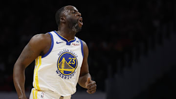 Feb 27, 2024; Washington, District of Columbia, USA; Golden State Warriors forward Draymond Green (23) reacts after making a three point field goal against the Washington Wizards in the first half at Capital One Arena. Mandatory Credit: Geoff Burke-Imagn Images