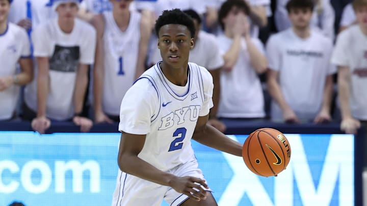 Jan 27, 2024; Provo, Utah, USA; Brigham Young Cougars guard Jaxson Robinson (2) brings the ball up the court against the Texas Longhorns during the second half at Marriott Center. Mandatory Credit: Rob Gray-Imagn Images