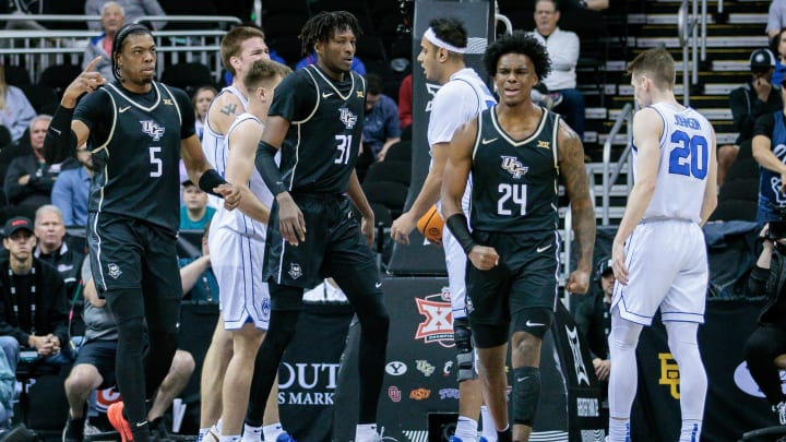 Mar 13, 2024; Kansas City, MO, USA; UCF Knights guard Jaylin Sellers (24) reacts after a play during the first half against the Brigham Young Cougars at T-Mobile Center. Mandatory Credit: William Purnell-USA TODAY Sports