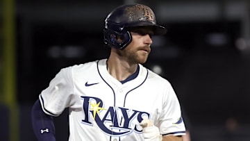 Sep 16, 2025; St. Petersburg, Florida, USA; Tampa Bay Rays second baseman Brandon Lowe (8) hits a 3-run home run during the third inning against the Toronto Blue Jays  at George M. Steinbrenner Field. 