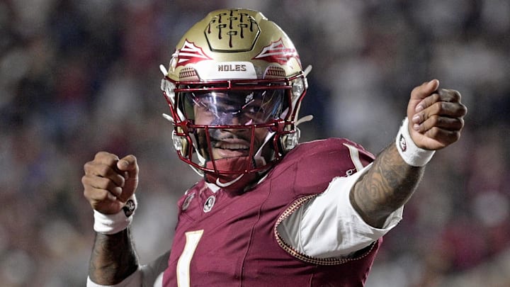 Nov 1, 2025; Tallahassee, Florida, USA; Florida State Seminoles quarterback Tommy Castellanos (1) celebrates a touchdown during the second half against the Wake Forest Demon Deacons at Doak S. Campbell Stadium. Mandatory Credit: Melina Myers-Imagn Images Nov 1, 2025; Tallahassee, Florida, USA; Florida State Seminoles quarterback Tommy Castellanos (1) celebrates a touchdown during the second half against the Wake Forest Demon Deacons at Doak S. Campbell Stadium. Mandatory Credit: Melina Myers-Imagn Images