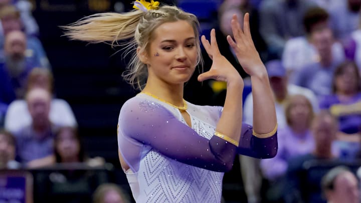  LSU Lady Tigers senior Olivia \"Livvy\" Dunne performs a floor routine against the Arkansas Razorbacks.