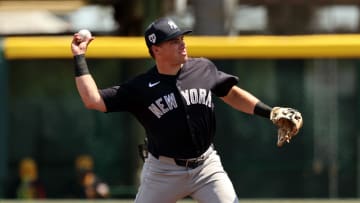 Mar 24, 2024; Bradenton, Florida, USA; New York Yankees infielder Caleb Durbin (87)  throws the ball for an out during the second inning against the Pittsburgh Pirates at LECOM Park. Mandatory Credit: Kim Klement Neitzel-USA TODAY Sports