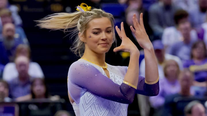 Feb 2, 2024; Baton Rouge, LA, USA;  LSU Lady Tigers senior Olivia \"Livvy\" Dunne performs a floor routine against the Arkansas Razorbacks at Pete Maravich Assembly Center. Mandatory Credit: Matthew Hinton-USA TODAY Sports