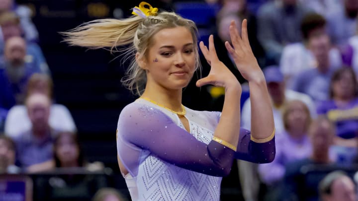 Feb 2, 2024; Baton Rouge, LA, USA;  LSU Lady Tigers senior Olivia \"Livvy\" Dunne performs a floor routine against the Arkansas Razorbacks at Pete Maravich Assembly Center.