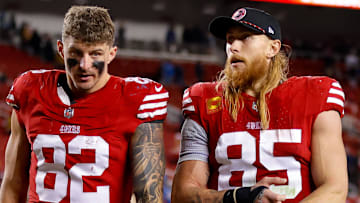 San Francisco 49ers tight end George Kittle (85) and former tight end Eric Saubert (82) after the game against the Detroit Lions at Levi's Stadium.