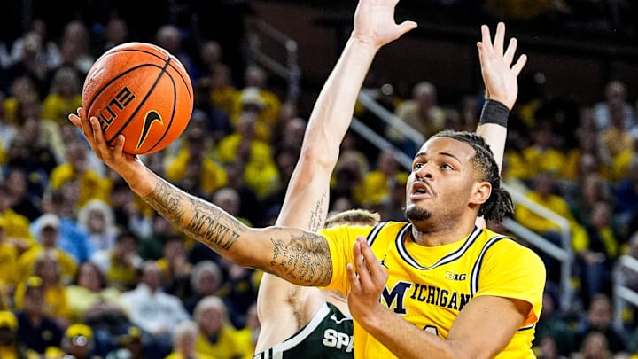 Michigan guard Roddy Gayle Jr. (11) makes a lay up against Michigan State during the first half at Crisler Center in Ann Arbor on Sunday, March 8, 2026.