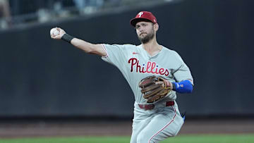 Aug 25, 2025; New York City, New York, USA;  Philadelphia Phillies shortstop Trea Turner (7) throws out New York Mets third baseman Mark Vientos (27) (not pictured) after fielding a ground ball during the second inning at Citi Field.
