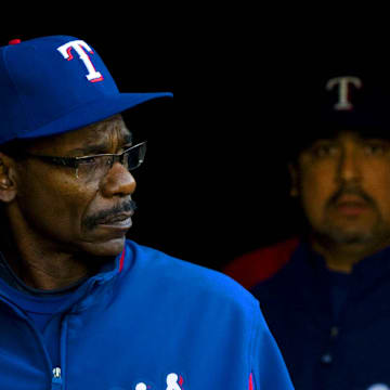 Texas Rangers manager Ron Washington (left) and pitcher Eddie Guardado (right) walk out from the player tunnel before the game against the Oakland Athletics at Oakland-Alameda County Coliseum on May 6, 2009.