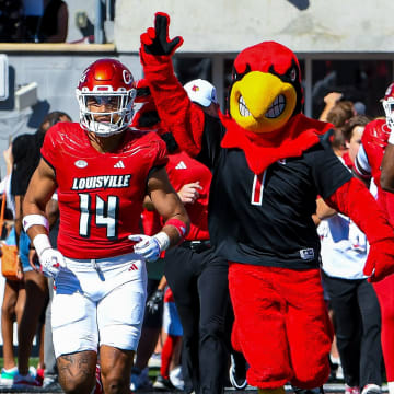 Louisville Players and Louie