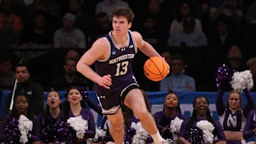 March 22, 2024, Brooklyn, NY, USA; Northwestern Wildcats guard Brooks Barnhizer (13) controls the ball against the Florida Atlantic Owls in the first round of the 2024 NCAA Tournament at the Barclays Center. Mandatory Credit: Brad Penner-Imagn Images
