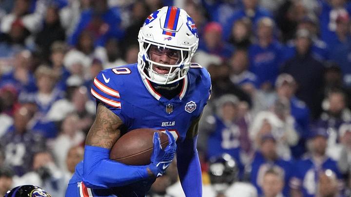 Sep 7, 2025; Orchard Park, New York, USA;  Buffalo Bills wide receiver Keon Coleman (0) runs the ball against Baltimore Ravens cornerback Jaire Alexander (23) during the fourth quarter at Highmark Stadium. Mandatory Credit: Gregory Fisher-Imagn Images