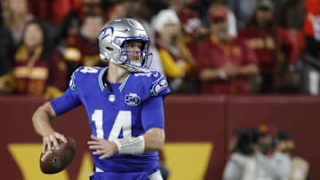 Nov 2, 2025; Landover, Maryland, USA; Seattle Seahawks quarterback Sam Darnold (14) throws the ball against the Washington Commanders during the first half at Northwest Stadium. Mandatory Credit: Amber Searls-Imagn Images
