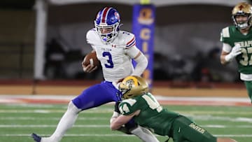 St. Bonaventure's Dylan Dunst tackles Folsom quarterback Ryder Lyons during the fourth quarter of the CIF-State Division 1-A state championship bowl at Saddleback College in Mission Viejo on Saturday, Dec. 9, 2023. St. Bonaventure lost 20-14.