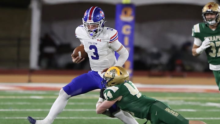 St. Bonaventure's Dylan Dunst tackles Folsom quarterback Ryder Lyons during the fourth quarter of the CIF-State Division 1-A state championship bowl at Saddleback College in Mission Viejo on Saturday, Dec. 9, 2023. St. Bonaventure lost 20-14.